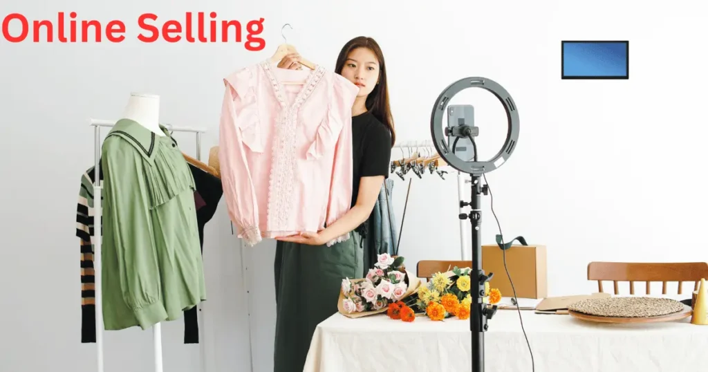 A women taking pictures of clothes to sell them online